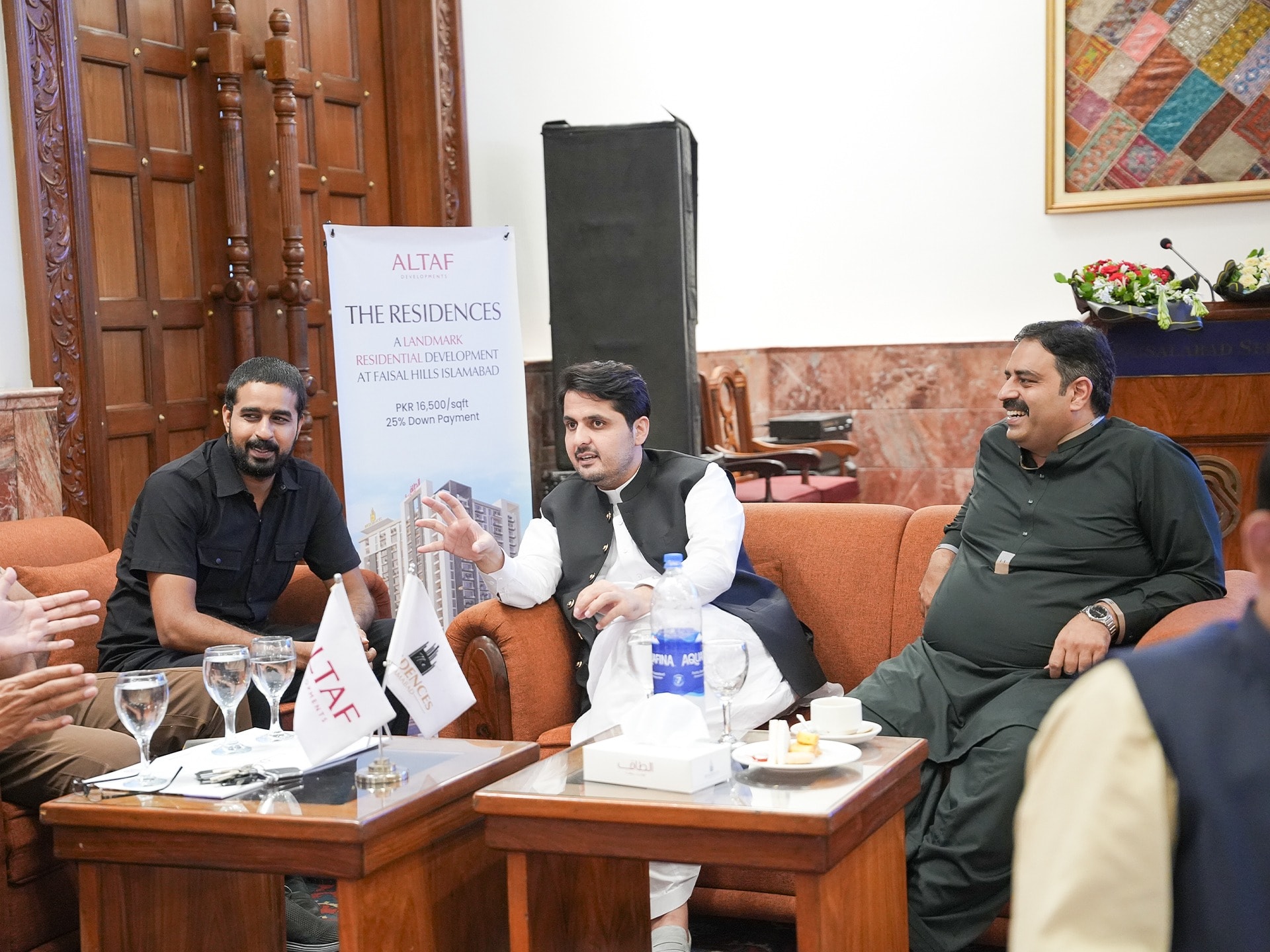 Guests discussing The Residences at the Faisalabad Expo